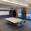 Table and chairs set up in Owl Meeting Room