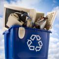 Recycling bin filled with computer accessories