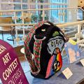 Art contest entries sitting on a table in Old Worthington Library