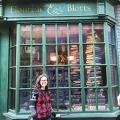 Cora S standing in front of Flourish and Blotts bookstore